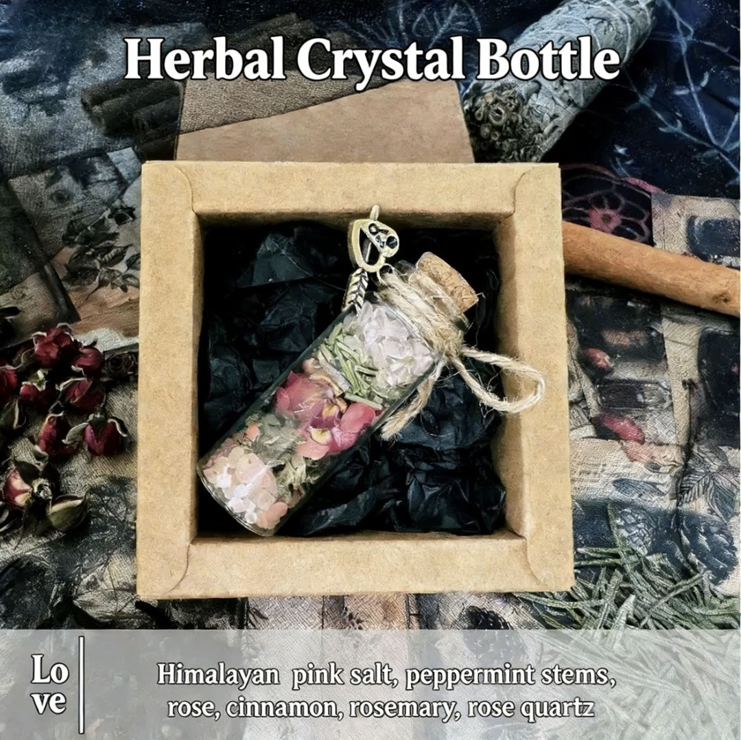 Herbal crystal bottle in a box with dried herbs and crystals on a textured background